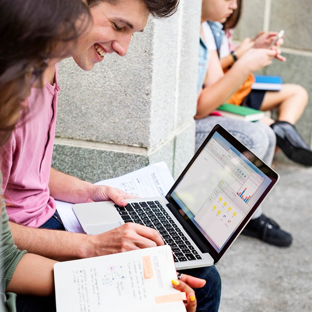 students-doing-homework-in-the-park (1)